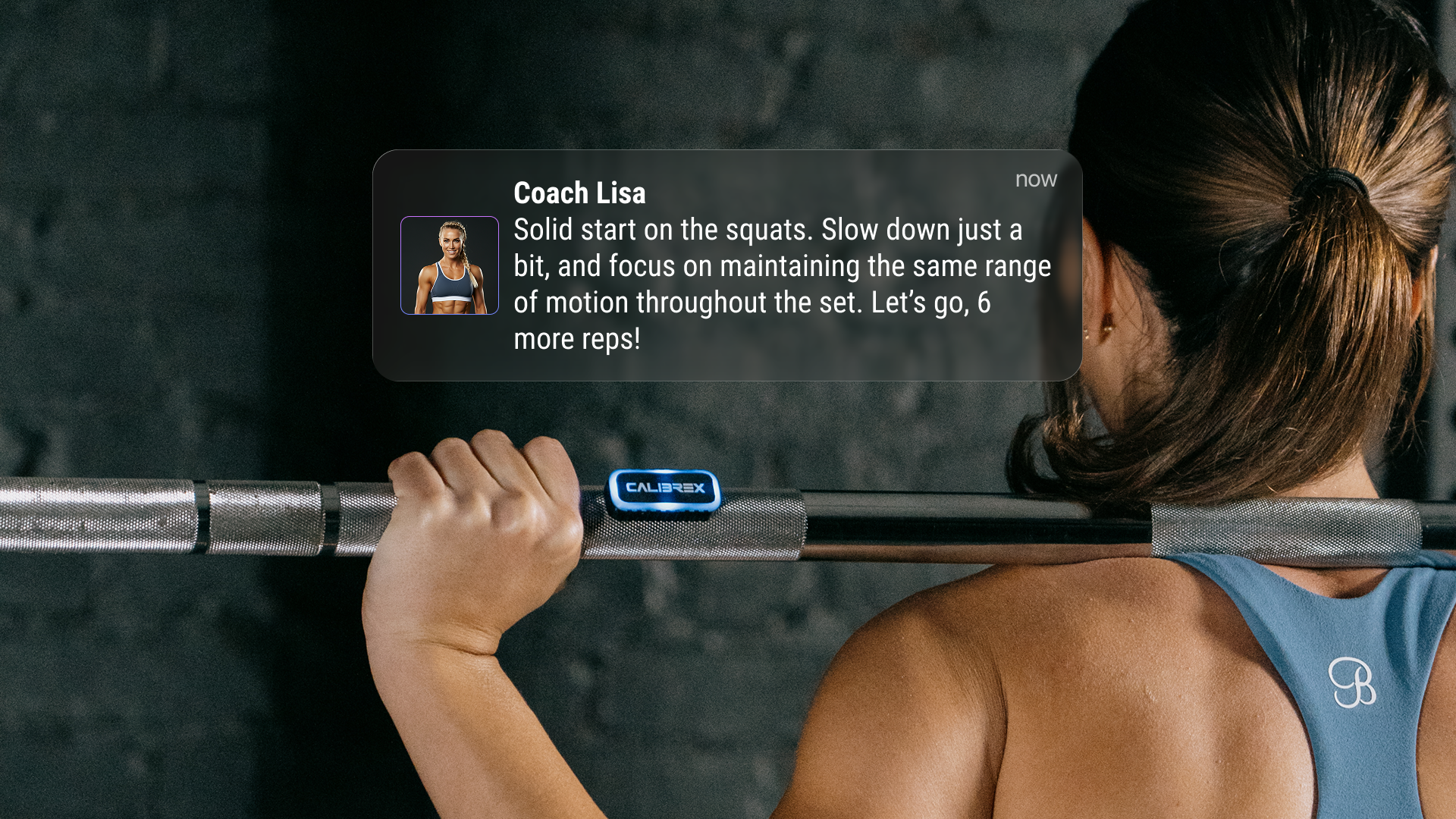 Person lifting a barbell with Calibrex coach's message on a screen above them.